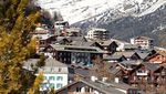 Saas Fee Ortsansicht Panorama Sonne